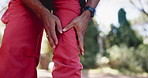 Hands, knee pain and hiking in forest with injury, sore muscle or massage for tendinitis on adventure. Person, trekking and joint ache with inflammation, fatigue or burnout with arthritis in woods