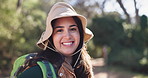 Hiking, happy and face of woman outdoor for trekking, adventure and exercise hobby in nature. Fitness, mountain and portrait of person for backpacking, travel and wellness with fresh air on weekend