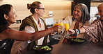 Drinks, kitchen and senior women with toast for bonding, conversation and culinary lesson. Cheers, social reunion and mature friends with lunch, discussion and salad for learning recipes in home