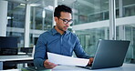Laptop, typing or businessman with paper in office, statement audit or check accounting compliance. Reading, document accuracy or employee review finance report, record finding or edit mistake on pc
