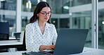 Employee, glasses and woman with laptop, office and ideas for wealth management, thinking and online. Financial analyst, typing and person with tech for risk assessment and planning for investment