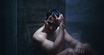 Thinking, depressed and man in shower crying for disappointment, failure and crisis. Bathroom, dark and person with thoughtful, reflection and sadness for mental health, mistake and frustrated