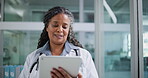 Doctor, thinking or black woman with tablet in clinic, review medical record or patient history reflection. Treatment planning, thoughtful or mature physician with idea for healthcare, tech or smile