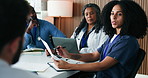 Woman, talking and doctors in meeting, documents and feedback for hospital schedule. Team, medical service and people in clinic, compliance policy and review for medicare support or healthcare report