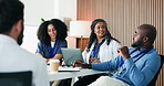 Man, talking and doctors in meeting, healthcare and feedback for hospital management. People, medical service and employees in clinic, discussion or survey for medicare review, planning and questions