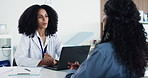 Doctor, talking and checkup with woman in office for consultation, medical report and diagnosis. People, laptop and discussion with clipboard, patient symptoms and healthcare opinion for treatment