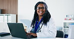 Glasses, doctor and laptop with woman in office at hospital for telehealth, consultant and medical advisor. Professional, tech and healthcare with mature person in clinic for patient care service