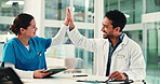 Meeting, high five and doctors with nurses in hospital boardroom for surgery schedule in collaboration. Discussion, professional and team of healthcare employees with medical service in clinic.