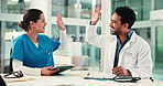 People, doctor and high five with nurse in office for good news, celebration and surgery success. Staff, tablet and congratulations on medical achievement, treatment victory or thank you for teamwork