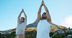 Yoga, low angle or men outside with meditation, mindfulness or guide in wellness activity. Pilates, mountain pose or instructor outdoor with stretching, zen or mindset improvement in holistic class.