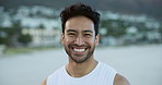 Happy, beach and face of man on holiday, getaway or weekend trip in summer with positive attitude. Smile, relax and portrait of male person by ocean for vacation or retreat with calm in Mexico.