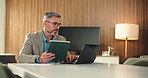 Tablet, laptop and research with business man in office for payroll manager, tax ledger and planning. Account report, online bookkeeping review and audit submission with mature person in agency