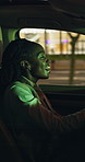 Black woman, driver and singing in car at night for travel, listening to music and karaoke. Female person, driving and dancing in vehicle for nightlife commute, streaming playlist and adventure audio