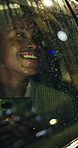Night, travel and black woman in car, cellphone and excited for city light, window and adventure. Evening, smartphone and person in vehicle, smile and journey in urban town or sightseeing in New York