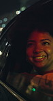 Night, travel and happy woman in car, window and excited for city light, journey and holiday. Evening, tourism and person in vehicle, smile and adventure in urban town and sightseeing in New York