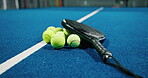 Empty court, padel and balls for game, competition and sports on turf for training in arena. Tennis, gear and equipment with racket on floor for exercise, practice or match with fitness in club