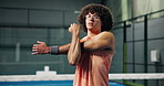 Stretching, workout and man in padel court, fitness and getting ready for sport tournament or match. Training, tennis player and exercise for competition preparation, warm up and person with routine