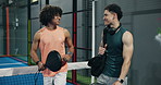 Padel, walking and men in center with preparation, communication and bonding together for fitness match. Tennis, start and athlete at court with discussion, friendship and support in game practice.