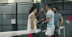 Padel, racket and friends with fist bump on court, fitness training and motivation for practice match. Teamwork, sports  workout and group of people with gear for tennis game, solidarity and support