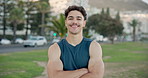 Face, fitness and man with arms crossed, outdoor and exercise for health benefits. Pride, wellness and person in city, workout and challenge for body development, confidence and training with break