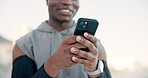 Fitness, outdoor and man with cellphone, hands and digital app to track progress. Healthy person, training and athlete in city, smartphone and social media with space, email and message to contact