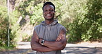 Face, fitness and smile with black man outdoor for health, wellness and laughing with confidence. Portrait, arms crossed and happy runner in nature for exercise, active athlete and funny person