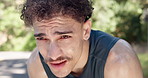 Fitness, rest or man in park with sweat, cardio challenge or breathing break in intense practice. Tired, burnout or athlete outdoor with exercise, running fatigue or recovery for performance goals.