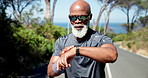 Nature, smart watch and black man with running for workout, training or wellness in morning. Sunglasses, fitness tech and mature African male athlete with cardio exercise in park for outdoor practice
