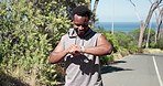Nature, smart watch and black man with running for exercise, training or wellness in morning. Sunglasses, fitness tech and African male athlete with cardio workout in park for outdoor practice.