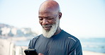 Fitness, outdoor and black man with cellphone, smile and digital app to track progress. Mature person, training and smartphone for texting, calm and internet for social media, connection and message
