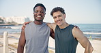 Men, runner and face with hug at beach, promenade and happy with fitness, break and bonding in summer. People, smile and portrait with embrace for training, wellness and rest for exercise by ocean