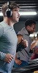 Man, treadmill and workout with headphones at gym, audio streaming and music at wellness class. Person, subscription and steps with equipment, sound or cardio exercise with challenge at fitness club