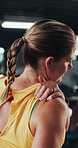 Sports, injury and woman in gym with shoulder pain, accident or muscle sprain with workout. Arthritis, osteoporosis and female athlete with joint inflammation, hurt or ache in fitness center.