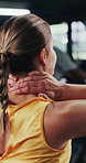 Back, fitness and neck pain with woman in gym for cramp, inflammation or muscle fatigue. Condition, exercise and sore with active person in health club for accident, fibromyalgia or spine injury