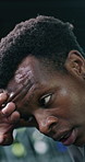 Fitness, tired or black man in gym with sweat, cardio challenge or breathing break in intense practice. Pause, bokeh or athlete with exercise, training fatigue or recovery for performance goals.