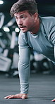 Fitness, push up or man in center with workout, power or cardio strength in endurance training. Concentration, challenge or athlete with floor press, intense exercise or core stability in muscle gain