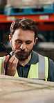 Businessman, warehouse and communication with radio for inventory or stock check in depot. Man, employee or talking with cargo for shipping, quality assurance or security in logistics or distribution