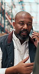Phone call, laptop and logistics worker in warehouse with communication for order information. Cellphone, computer and African male supply chain manager on mobile discussion for shipping confirmation