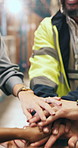 Business people, meeting or warehouse with hands together for teamwork, unity or mission. Closeup, group or employees with pile or stack in huddle, circle or depot for storage or supply chain success
