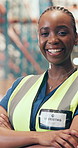 Crossed arms, black woman and face of logistics worker in warehouse with confidence for freight shipping. Happy, professional and portrait of supply chain manager with pride for quality control.