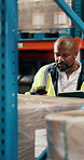 Logistics, scanner or black man with tablet in warehouse, inventory management or digital stock count. Package identification, tech or mature worker with shipment audit, delivery or storage process