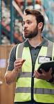 Man, tablet and meeting at warehouse for logistics, checklist or team talk for inventory management. Person, tech and problem solving with app, storage or notes for supply chain at distribution plant