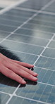 Hands, solar panels and technician checking for maintenance, repairs or quality control outdoor. Industry, ecology and engineer with inspection for renewable energy service with photovoltaic cells.