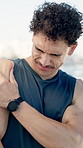 Active, man outdoor and shoulder pain from exercise challenge, difficult workout and medical problem. Hurt, person and athlete with joint inflammation, strain and muscle tension from sports injury.
