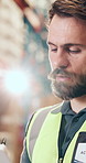 Man, inspection or writing in warehouse with clipboard, supply chain or logistics for quality control. Person, flare and checklist in depot for inventory management, shipping or distribution service.