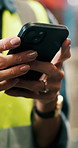 Hands, phone and texting at warehouse for logistics, notification or contact supplier for stock. Person, technician and smartphone with mobile app, shipping and supply chain at distribution plant