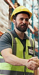 Man, shaking hands and smile at warehouse for distribution deal, success and goals with logistics career. Happy people, handshake and thanks with shipping agreement, storage and supply chain at plant