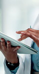 Hands, doctor and typing with tablet in hospital for research, medical report and schedule surgery. Person, digital and email for telehealth agenda, healthcare checklist and information for operation