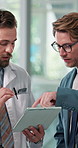 Collaboration, healthcare or tablet with administrator and doctor in hospital together for report. Administration, medical app or teamwork with manager and surgeon in clinic for feedback or update
