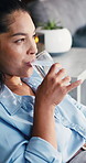 Drink water, relax and woman in drip lounge for healthcare, thinking and infusion therapy. IV, hydration and thirsty person with glass, minerals and benefits with medical treatment for wellness